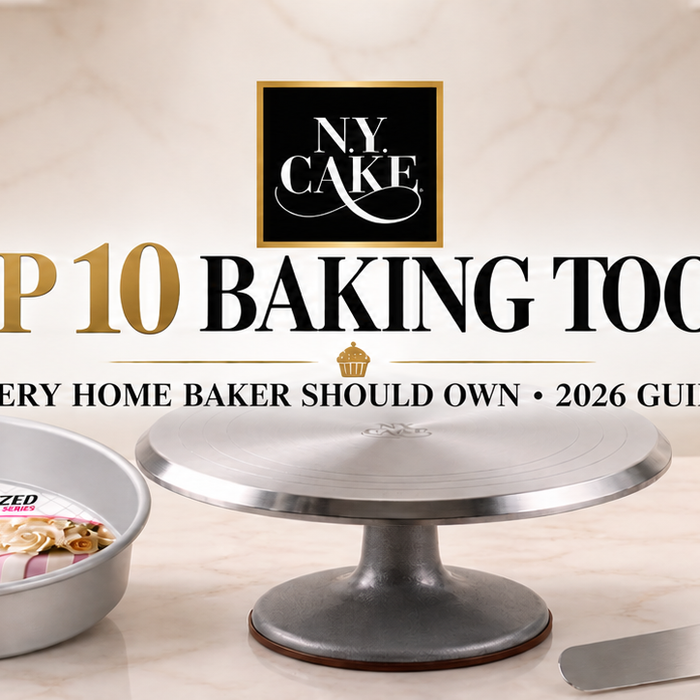 NY Cake top 10 baking tools featuring piping tips, anodized cake pan, turntable, cake scraper, piping bag, spatula, mixing bowl, and baking mat.