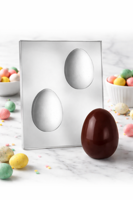 3D egg chocolate mold with finished chocolate egg for Easter candy making