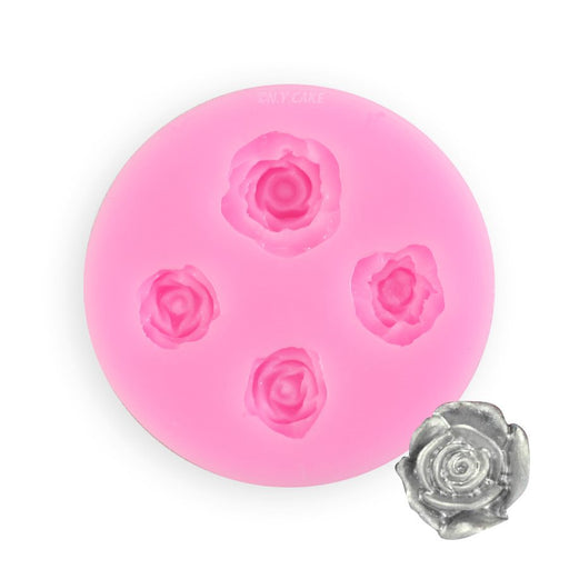 Pink silicone fondant mold with four assorted rose flower cavities for creating detailed edible floral decorations from fondant, gum paste, chocolate, candy, and cake decorating materials.
