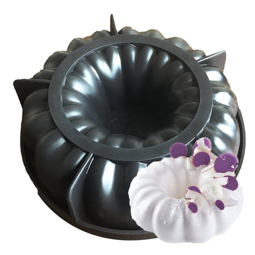 6.25-inch Bundt silicone baking and freezing mold with fluted design and 33.8-ounce capacity.