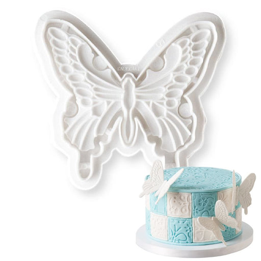 Large butterfly fondant cutter and embosser set for creating detailed butterfly decorations from fondant, gum paste, cookie dough, and modeling chocolate for cakes and cupcakes.