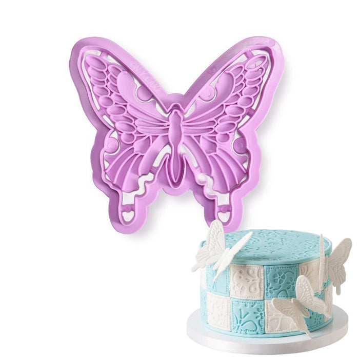 Purple butterfly plastic cutter and embosser set for creating detailed fondant butterflies, gum paste decorations, cookie designs, cupcake toppers, and cake decorating accents.