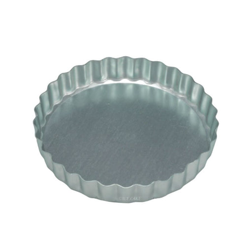 4 1/2 inch aluminum tart pan with solid bottom and fluted sides for baking mini tarts and quiches