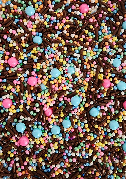 Chocolate Crunch Sprinkle Mix featuring colorful pearls, chocolate sprinkles, and crunchy decorations for cakes, cupcakes, cookies, and desserts.