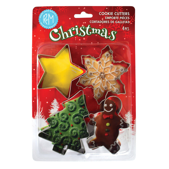 Packaged Christmas-themed cookie cutters with star, tree, gingerbread man, and snowflake designs on a red background.