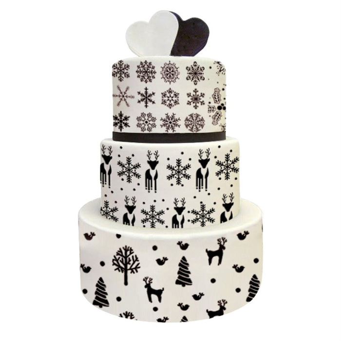 Christmas tiered cake decorated with reusable holiday cake stencils