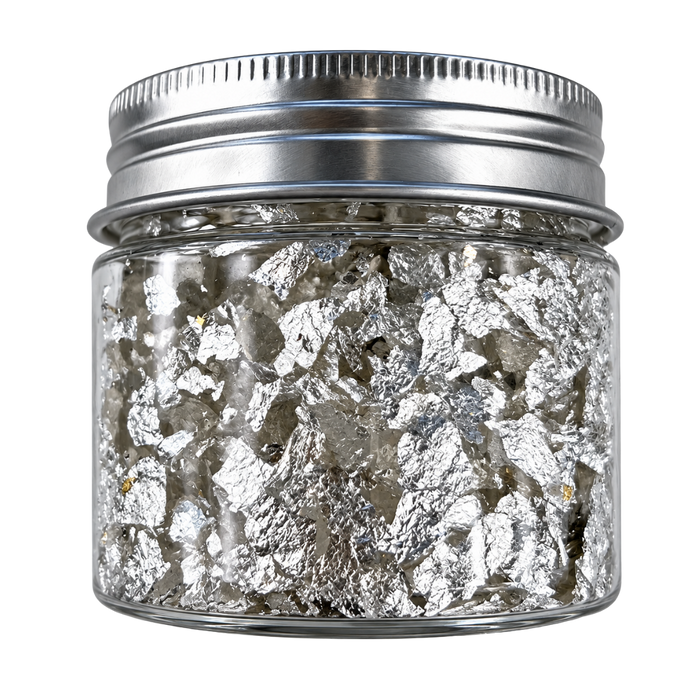 200mg jar of small-cut edible silver flakes for decorating cakes, chocolates, pastries and confections.