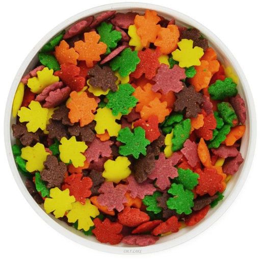 Fall leaves edible sprinkles in assorted orange, red, yellow, green and brown colors for decorating Thanksgiving cakes, cupcakes and cookies.