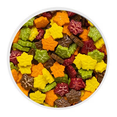 Assorted fall leaves edible sprinkles in orange, yellow, green, red and brown for decorating Thanksgiving cakes, cupcakes and cookies.