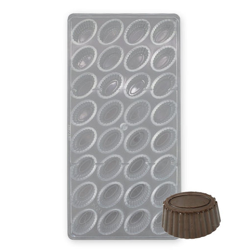 32-cavity fluted oval polycarbonate chocolate mold for making detailed professional chocolates.