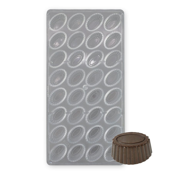 32-cavity fluted oval polycarbonate chocolate mold for making detailed professional chocolates.