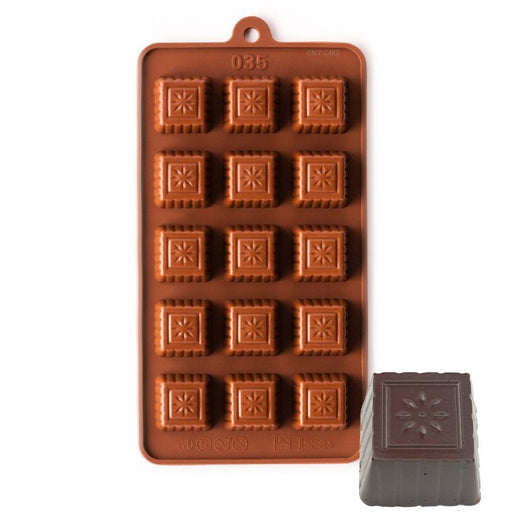 15-cavity fluted square flower silicone chocolate mold for making detailed chocolates, candies and decorative confections.