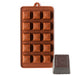 15-cavity fluted square flower silicone chocolate mold for making detailed chocolates, candies and decorative confections.