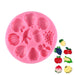 Pink 4-inch assorted fruit silicone fondant mold with detailed fruit cavities for fondant, gum paste, chocolate and cake decorations.