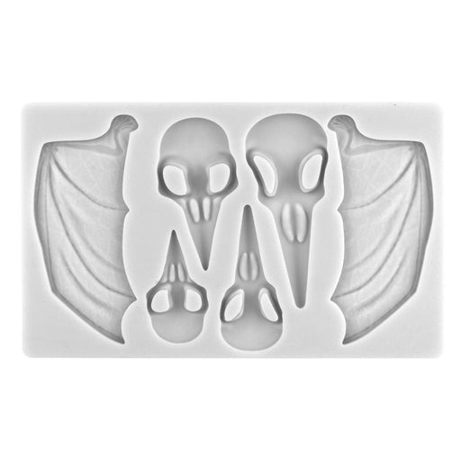 Silicone Halloween mold featuring large bat wings, fangs and teeth for fondant, chocolate and spooky cake decorations.