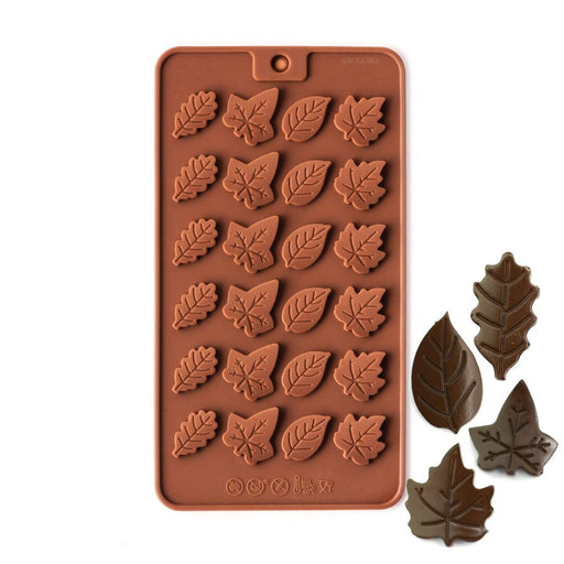 24-cavity silicone chocolate mold with assorted detailed leaf shapes for fall and Thanksgiving chocolates and dessert decorations.