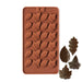 24-cavity silicone chocolate mold with assorted detailed leaf shapes for fall and Thanksgiving chocolates and dessert decorations.