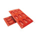 Red 8-cavity Madeleine silicone baking mold for 1 oz cakes, chocolate, mousse, brownies, candy and desserts by NY Cake®