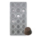 Polycarbonate chocolate mold featuring 18 medium fluted round cavities for creating glossy chocolates, truffles, and peanut butter cup-style confections.
