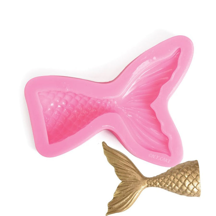 Pink mermaid tail silicone fondant mold with detailed scale texture for creating edible cake decorations, fondant toppers, gum paste accents, chocolate decorations, and ocean-themed desserts.