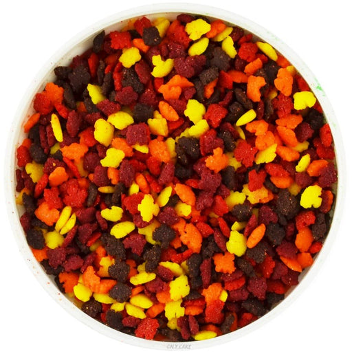 Mini fall leaves edible sprinkles in red, orange, yellow and brown for decorating Thanksgiving cakes, cupcakes, cookies and other desserts.
