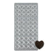 Polycarbonate chocolate mold featuring 55 mini heart-shaped cavities, including rounded-top and flat-top designs, for creating glossy chocolates and candy favors.