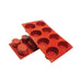 Red 12 cavity silicone oval baking mold with 3.4 oz cavities for cakes, mousse desserts, chocolates, pastries, brownies, and candy making.