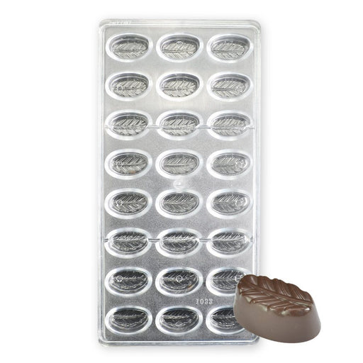 Polycarbonate chocolate mold featuring 24 oval leaf-pattern cavities for creating glossy artisan chocolates, bonbons, and truffles.