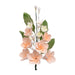 Handmade peach plumeria spray sugar flowers with green leaves for wedding cakes, tropical cakes, and elegant edible cake decorating.