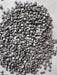 Pearlized silver sequin-shaped edible sprinkles for decorating cakes, cupcakes, cookies, chocolates, and special occasion desserts.