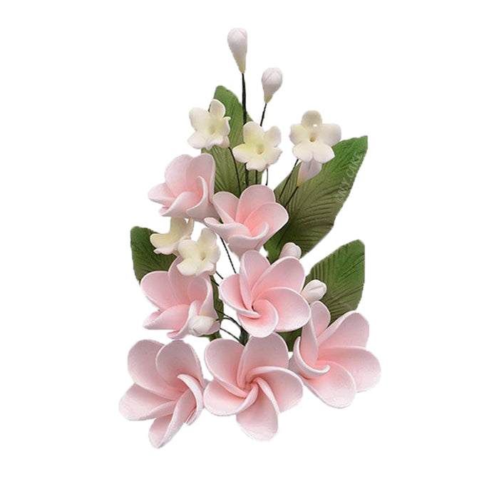 Handmade pink plumeria spray sugar flowers with green leaves for wedding cakes, tropical cakes, and elegant edible cake decorating.