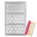 Clear polycarbonate chocolate mold with three pyramid-shaped geometric cavities displayed alongside finished chocolate bars made using the mold