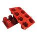 Red Bavarese silicone baking mold with multiple cavities for mousse desserts, cakes, chocolates, pastries, and frozen treats.