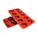 Red silicone dimpled heart baking mold for mousse cakes, chocolates, frozen desserts, pastries, and Valentine’s Day treats.
