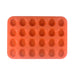 Orange silicone mini muffin cupcake pan with 24 cavities for baking mini cupcakes, muffins, chocolates, candy, and bite-sized desserts