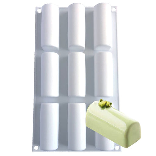 White silicone log cake baking and freezing mold with 9 cavities for mousse desserts, pastries, mini cakes, and bakery creations.