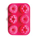 Pink silicone mini bundt cake mold with 6 decorative cavities for baking cakes, mousse desserts, chocolates, and frozen treats by NY Cake®