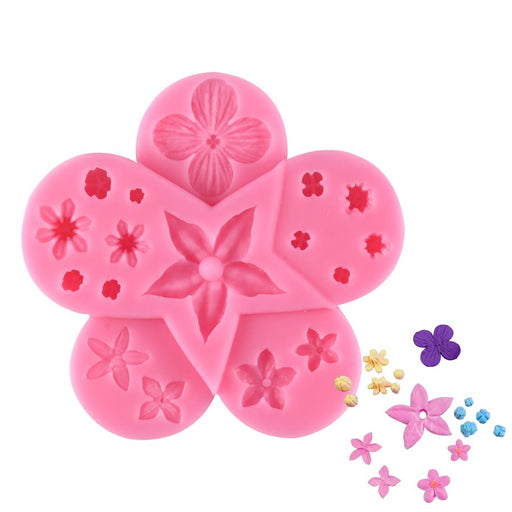 Pink petaled flower silicone fondant mold for cake decorating, cupcakes, chocolates, candy making, and edible floral dessert decorations.