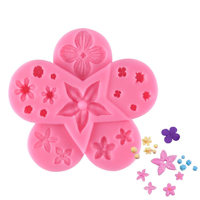 Pink petaled flower silicone fondant mold for cake decorating, cupcakes, chocolates, candy making, and edible floral dessert decorations.