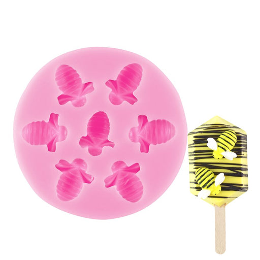 Pink honeybee silicone mold with 7 detailed bee cavities for fondant, chocolates, candy making, cupcake toppers, and cake decorating by NY Cake®