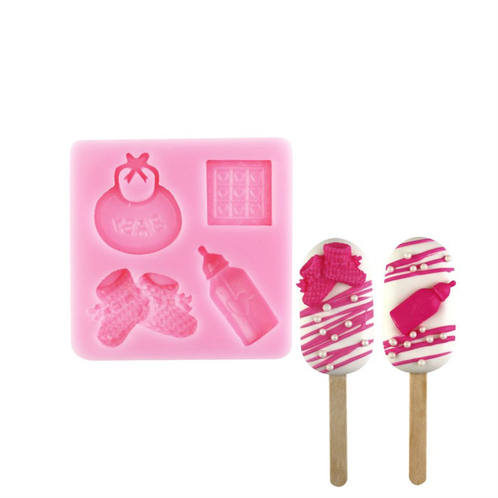 Pink baby items silicone mold featuring bib, baby shoes, bottle, and quilt cavity designs for fondant, chocolate, cake decorating, and baby shower desserts by NY Cake®