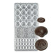 Polycarbonate chocolate mold with 20 assorted shell and fish cavities for creating detailed ocean-themed chocolates and candy decorations.