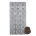 Polycarbonate chocolate mold with 21 small fluted round cavities for creating peanut butter cup-style chocolates, truffles, and gourmet confections.