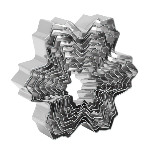 Set of 9 stainless steel snowflake cookie cutters in assorted sizes from 1 1/2 to 4 3/4 inches for Christmas baking.