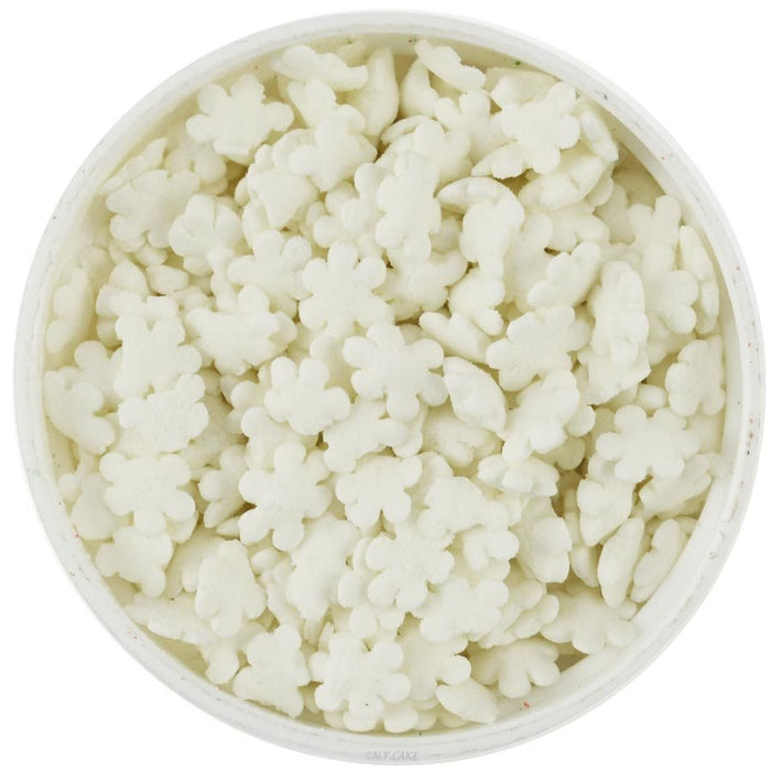 White snowflake sprinkles for Christmas cakes, cookies and desserts