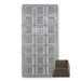 Polycarbonate chocolate mold with 21 square cavities featuring an embossed daisy flower design for creating glossy chocolates, bon bons, and truffles.