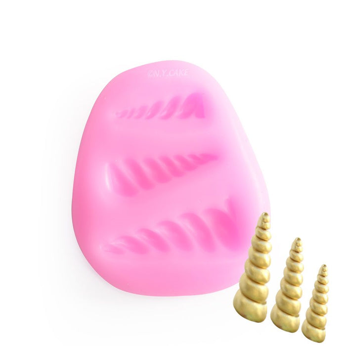 Pink unicorn horn silicone fondant mold with three cavity sizes for creating unicorn cake toppers, fondant decorations, gum paste accents, chocolate decorations, and fantasy-themed desserts.