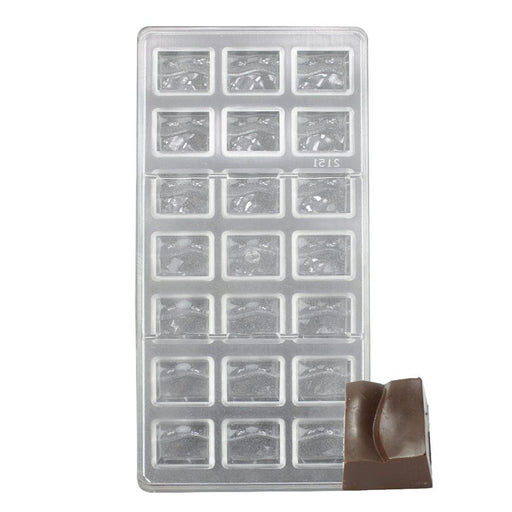 Polycarbonate chocolate mold with 21 wave-pattern cavities for creating smooth, glossy bon bons, truffles, and artisan chocolates.