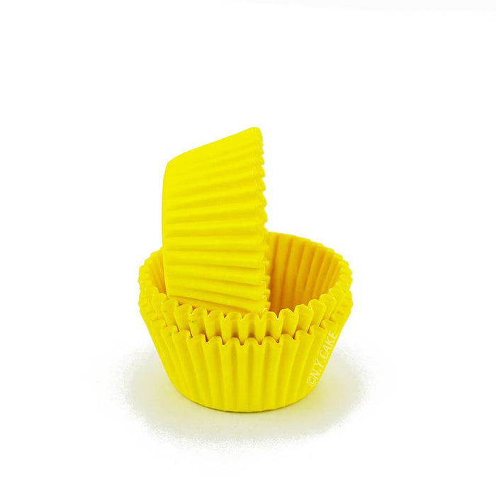 Yellow greaseproof mini cupcake baking cup liners for mini cupcakes, muffins, candies, chocolates, and bite-sized desserts.