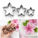 azalea flower cookie cutter set stainless steel shown in hand with fondant flower cake decoration example